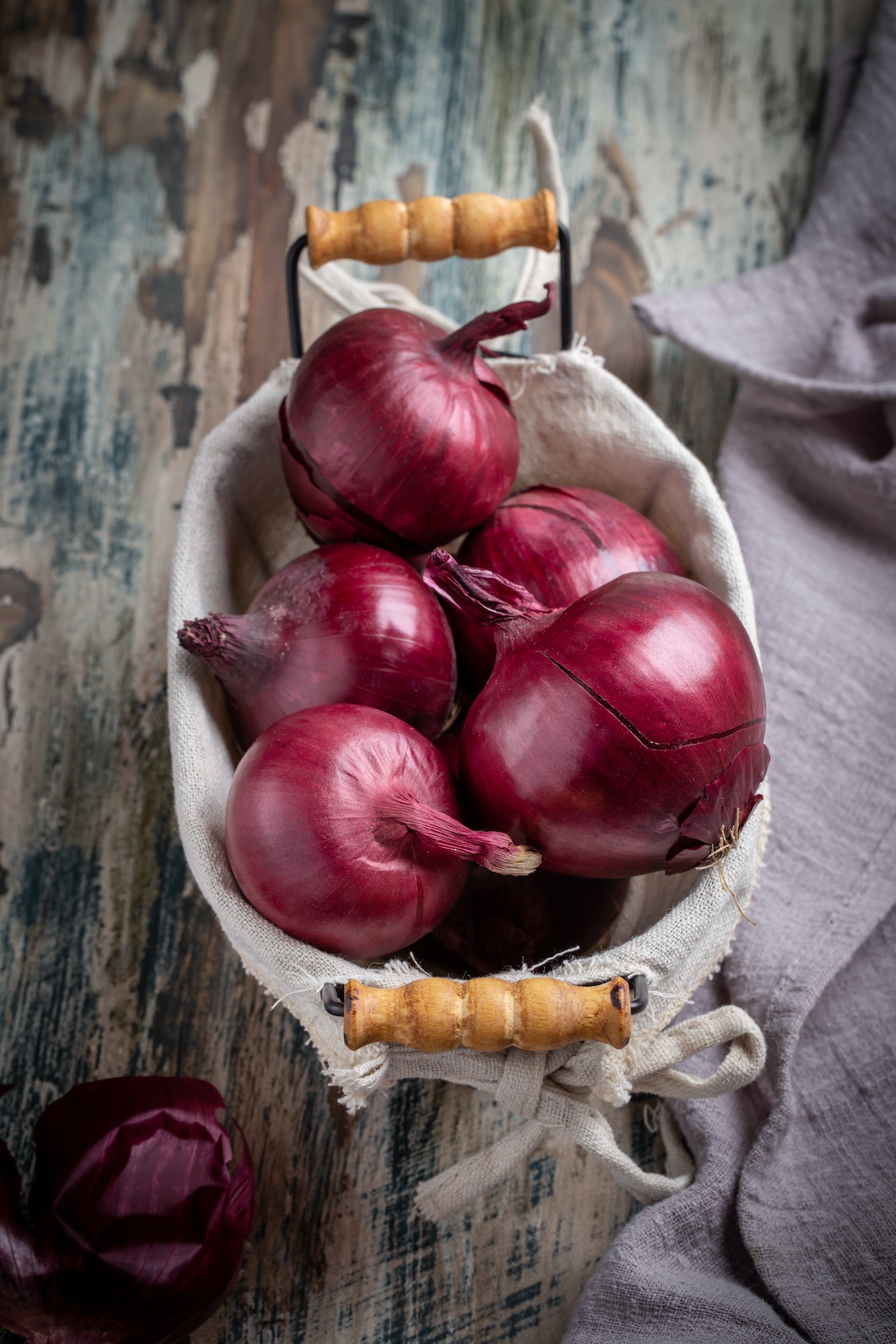 Red onion in small basket